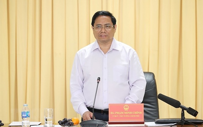 El primer ministro de Vietnam, Pham Minh Chinh, interviene en la reunión. (Fotografía: VNA)