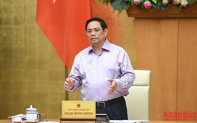El primer ministro Pham Minh Chinh habla en la reunión. (Fotografía: Nhan Dan)