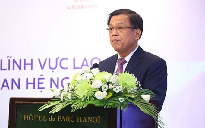 El viceministro de Trabajo, Inválidos de Guerra y Asuntos Sociales de Vietnam Nguyen Ba Hoan (Fotografía. hanoimoi.com.vn)