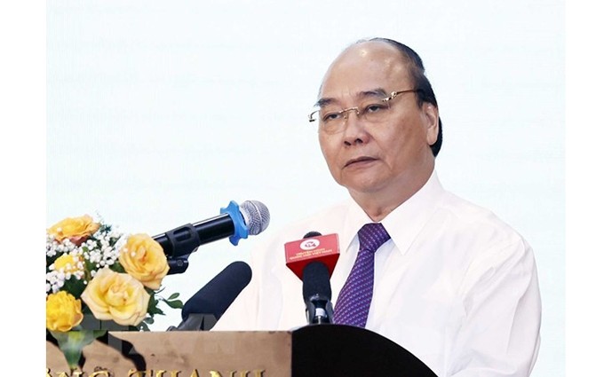 El presidente del país, Nguyen Xuan Phuc, habla en la reunión. (Fotografía: VNA) 