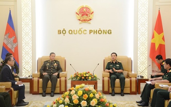 Escena de la reunión. (Fotografía: qdnd.vn)