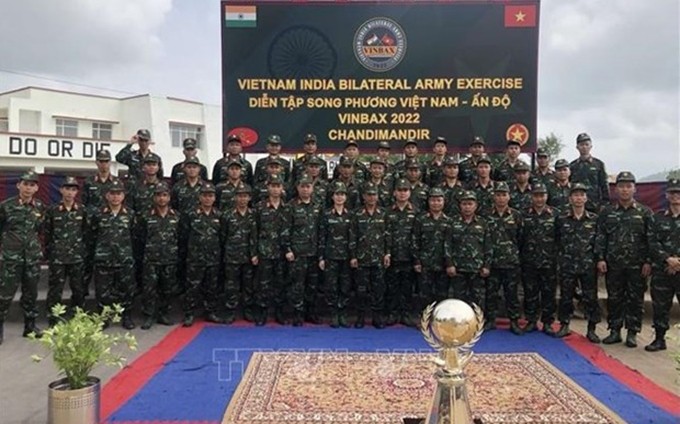 Delegados de Vietnam e India participan en el acto. (Fotografía: VNA)