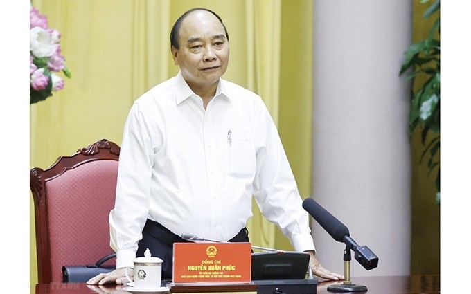 El presidente Nguyen Xuan Phuc interviene en la sesión. (Fotografía: VNA)