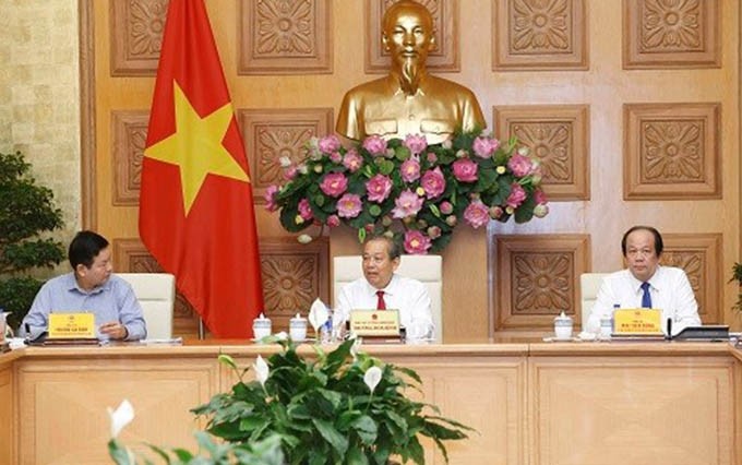El viceprimer ministro Truong Hoa Binh preside la conferencia (Fotografía: baochinhphu.vn)
