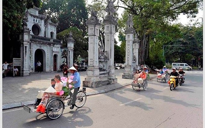 Turistas extranjeros en Hanói (Fuente: VNA)