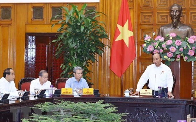 El primer ministro de Vietnam, Nguyen Xuan Phuc, en la reunión de trabajo con autoridades de Thua Thien-Hue. (Fotografía: VNA)