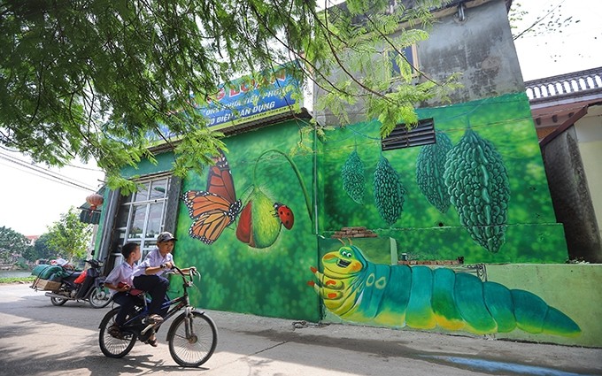 Un mural en la aldea de Chu Xa. (Fotografía: cand.com.vn)