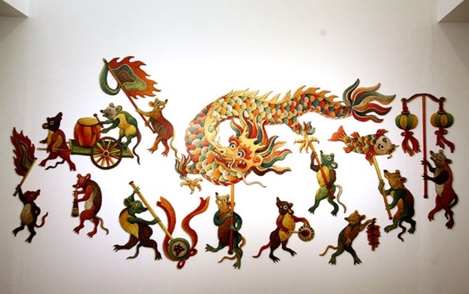 Obra copia de la pintura de Dong Ho “Ratones llevan al dragón”. (Fotografía: dangcongsan.vn)